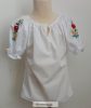 Girl's blouse with embroidered sleeves